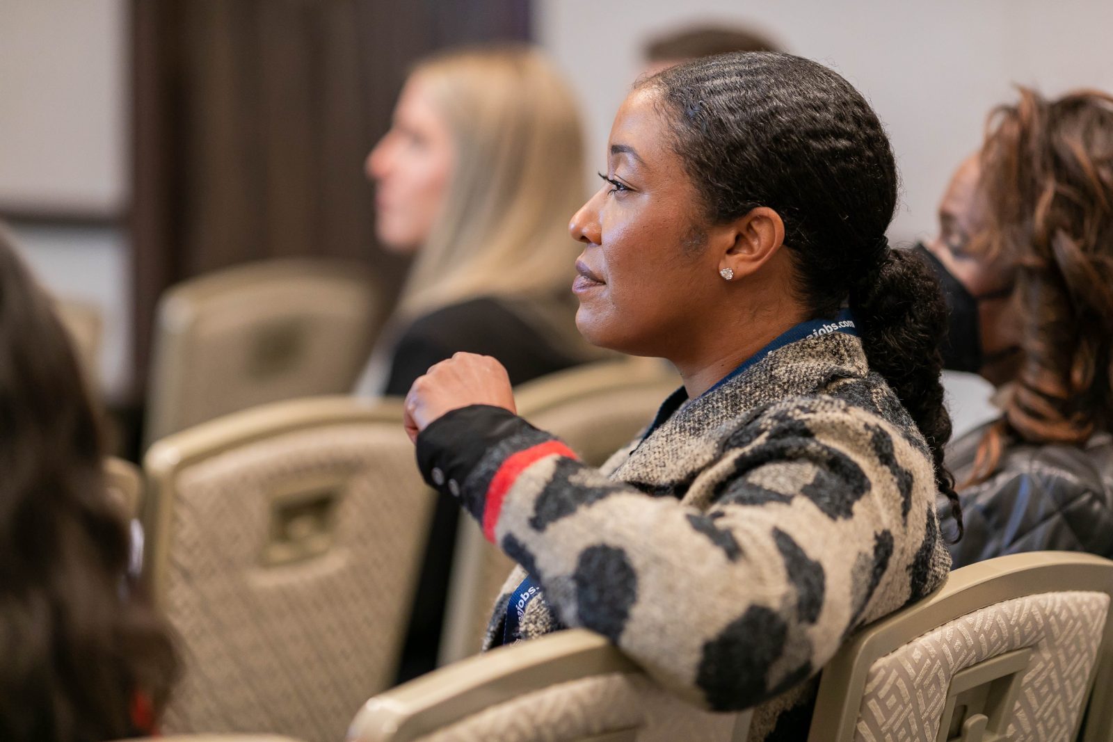 Attendee listening during a breakout session